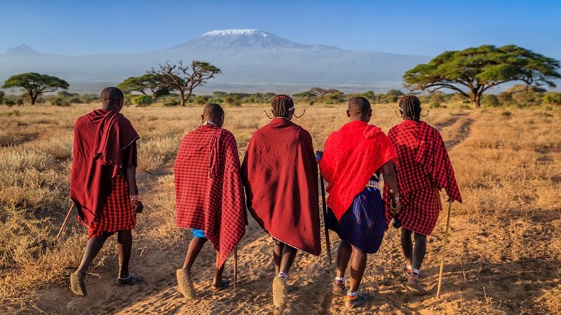 Image Credits: Gideon Sanago - A group of Indigenous African young men taking a walk in the East African plains.